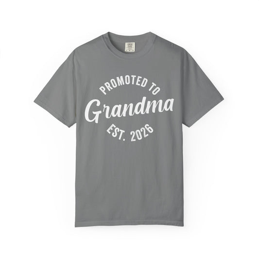 Gray t-shirt with 'Promoted to Grandma Est. 2026' text on a white background