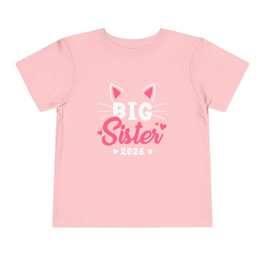 Pink t-shirt with 'Big Sister 2026' text and cat ears design on a white background