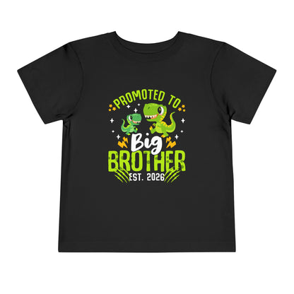 Black t-shirt with dinosaur graphics and text 'Promoted to Big Brother Est. 2026' on a white background