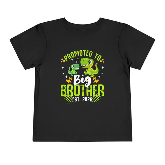 Black t-shirt with dinosaur graphics and text 'Promoted to Big Brother Est. 2026' on a white background