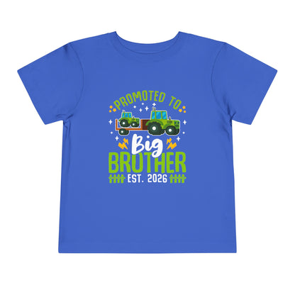 Blue t-shirt with 'Promoted to Big Brother Est. 2026' text and tractor graphic on a white background