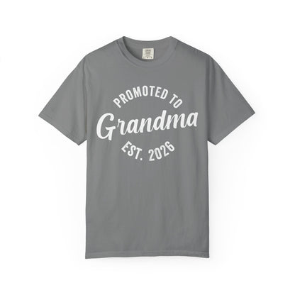Gray t-shirt with 'Promoted to Grandma Est. 2026' text on a white background