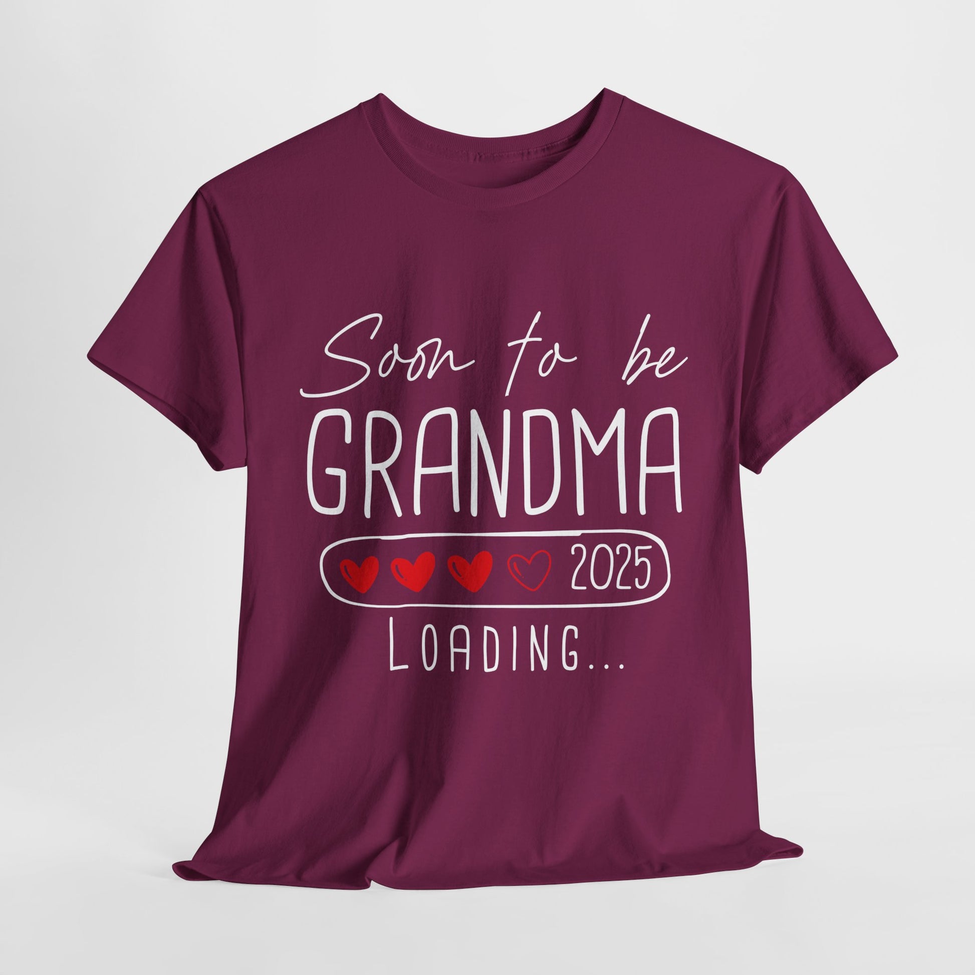 burgundy ‘Soon to Be Grandma 2025’ T‑shirt with elegant lettering and heart accent, perfect pregnancy reveal gift for grandma.